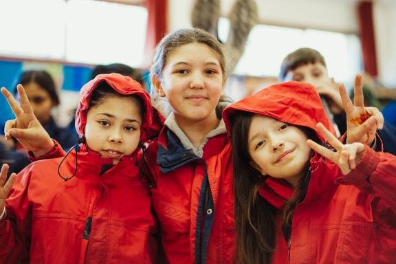 Three girls socialising