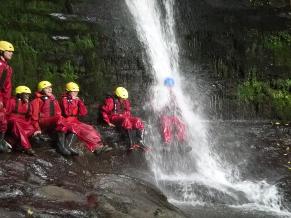 Group in waterfall 