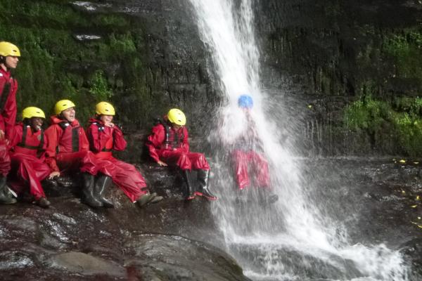 Group in waterfall 